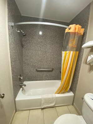 Bathtub, free toiletries, hair dryer, towels
