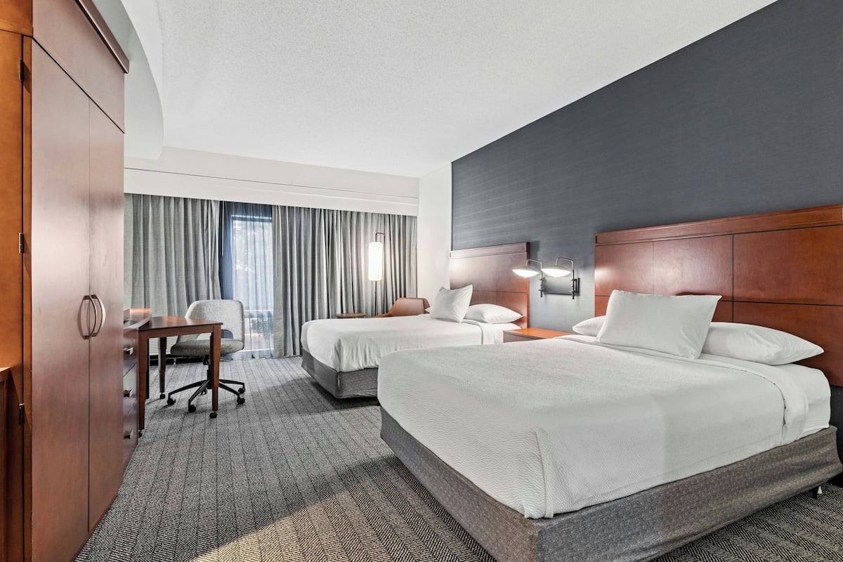 Premium bedding, pillow-top beds, desk, iron/ironing board