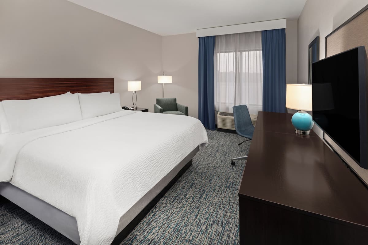 Premium bedding, pillowtop beds, desk, laptop workspace