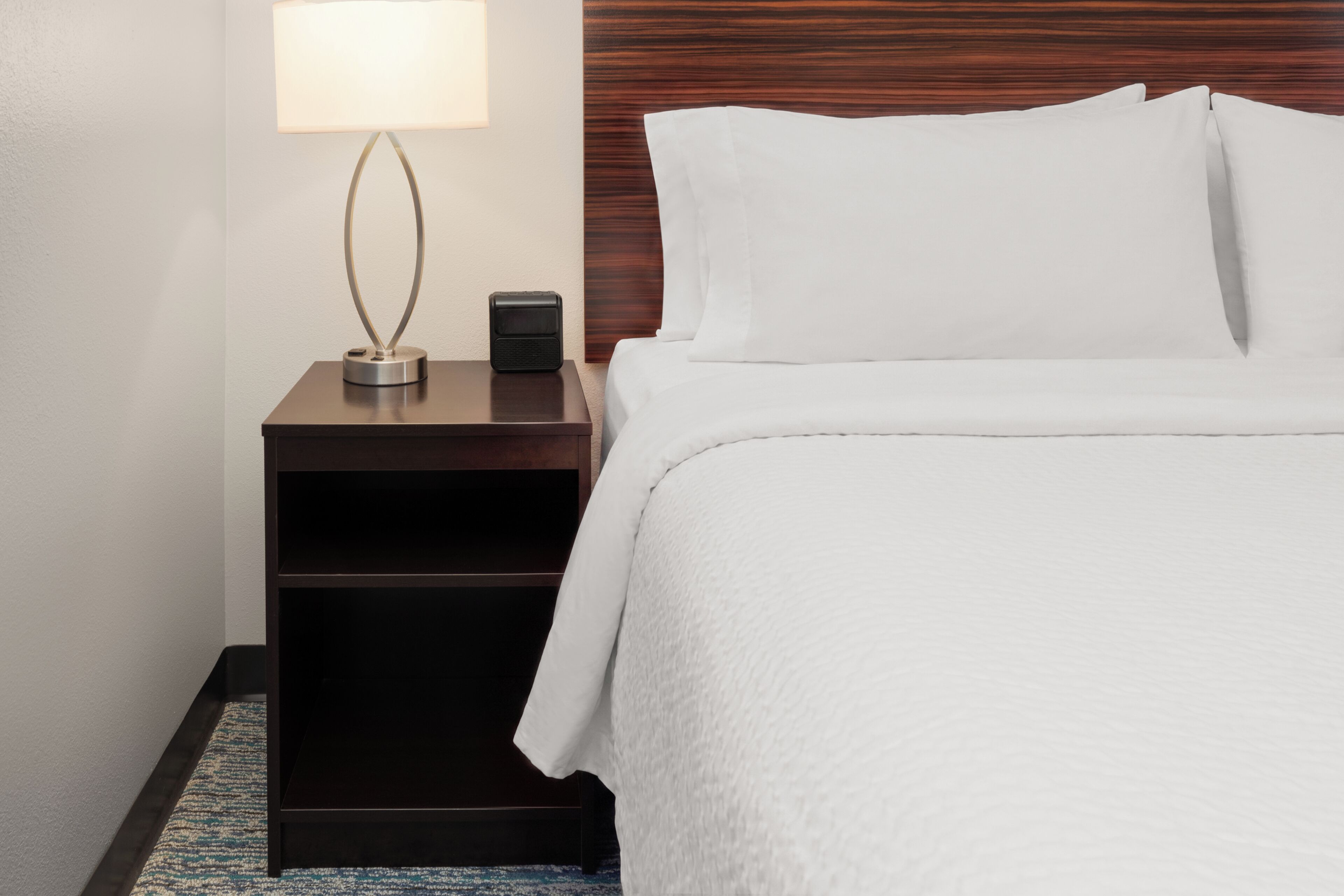 Premium bedding, pillowtop beds, desk, laptop workspace