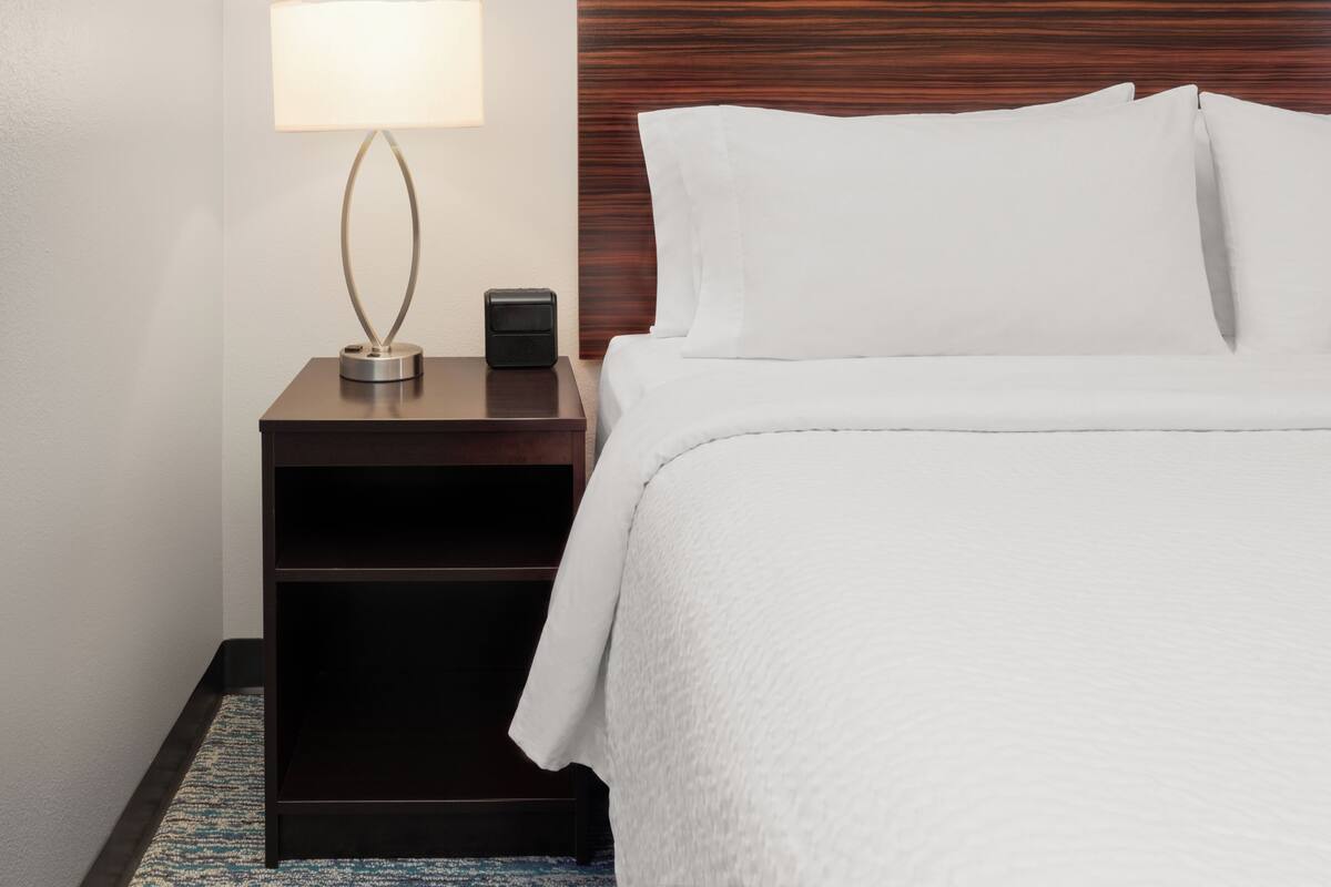 Premium bedding, pillowtop beds, desk, laptop workspace