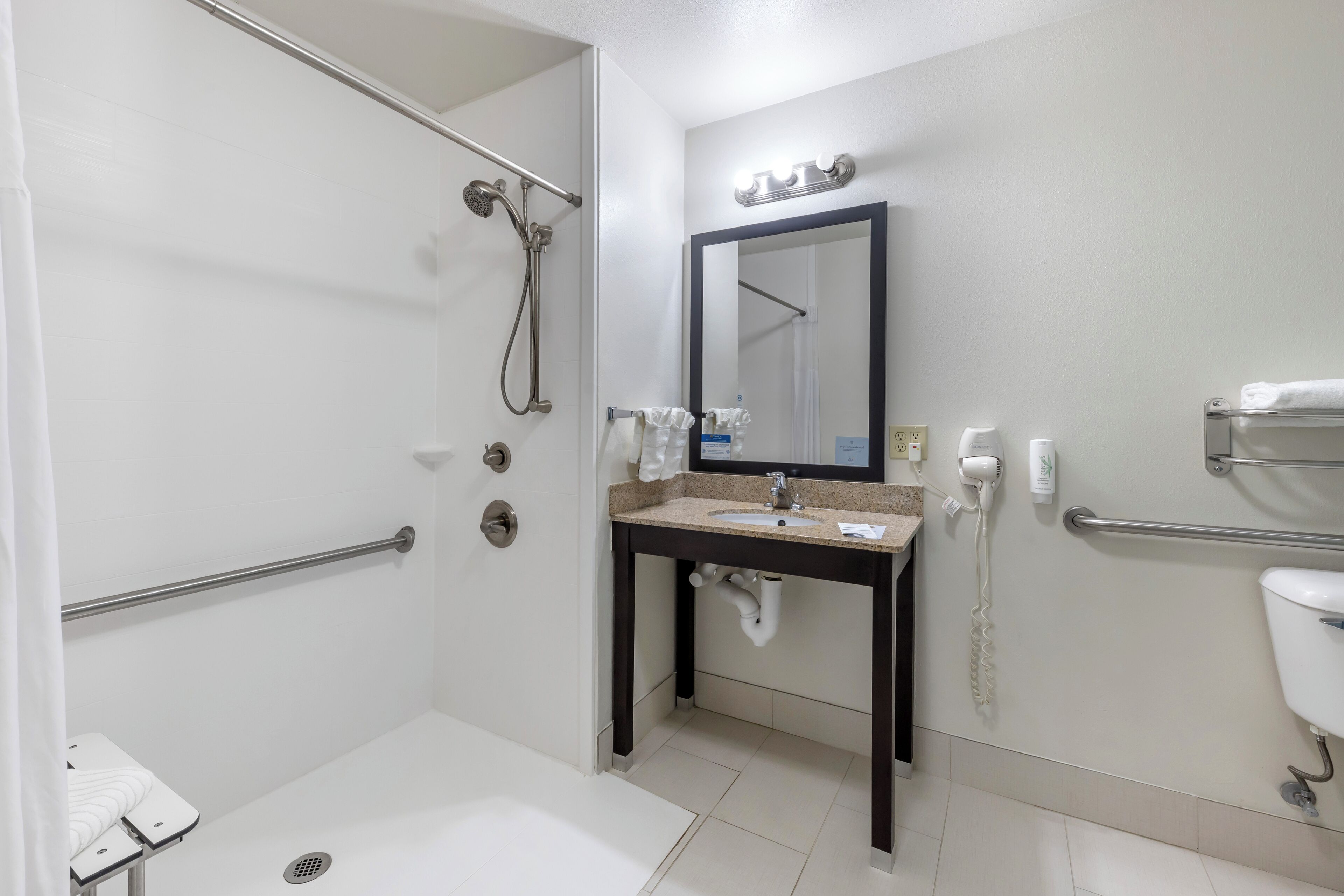 room, 2 queen beds, accessible, non smoking | bathroom | hydromassage showerhead, designer toiletries, hair dryer, towels