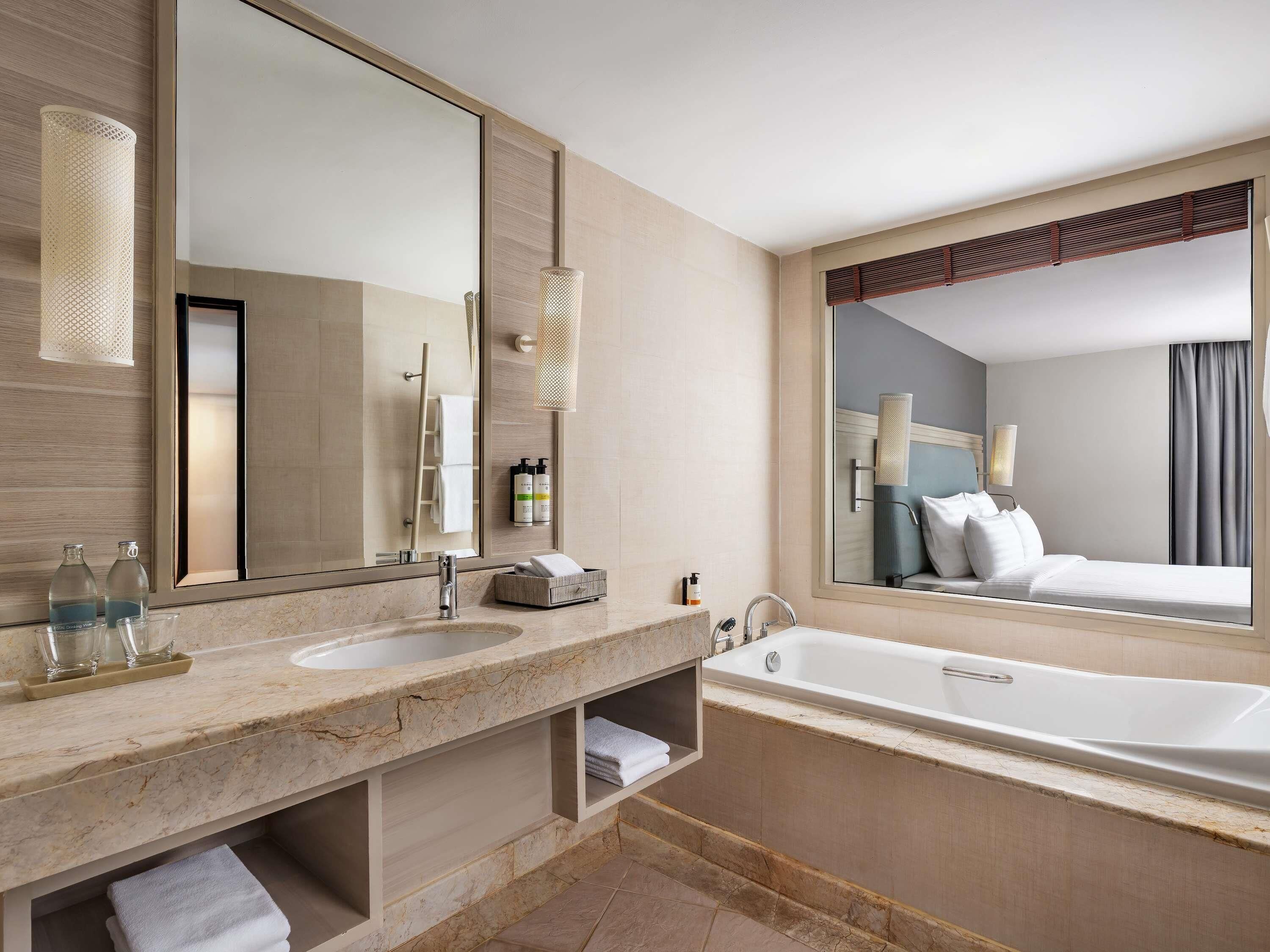 Family Suite, 1 Bedroom, Balcony, Garden View | Bathroom | Separate tub and shower, deep soaking tub, hydromassage showerhead