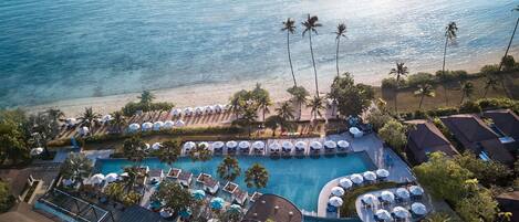 2 outdoor pools, open 7 AM to 7 PM, free cabanas, pool umbrellas