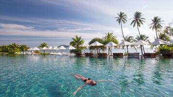 2 outdoor pools, open 7 AM to 7 PM, free cabanas, pool umbrellas