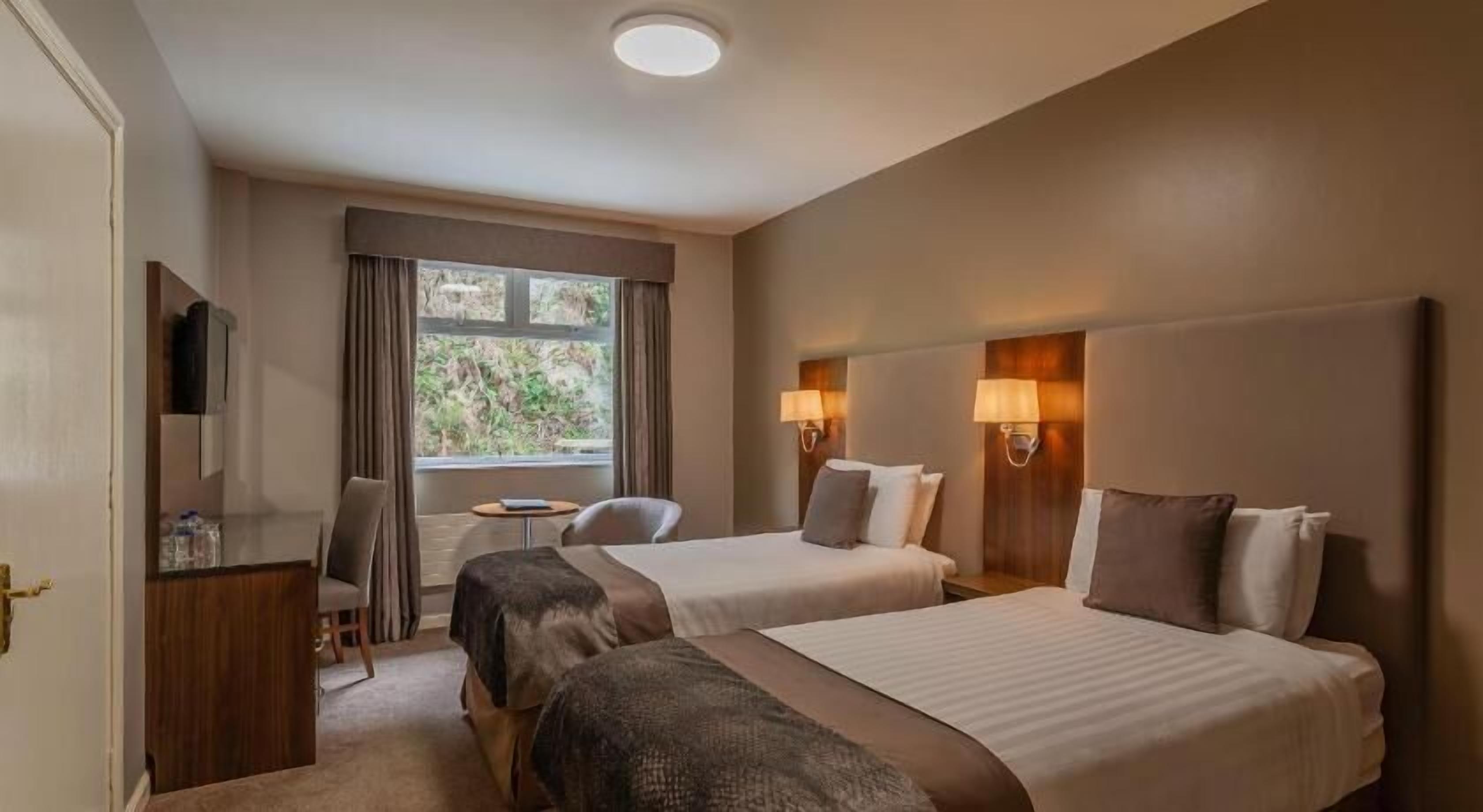 In-room safe, desk, blackout curtains, iron/ironing board