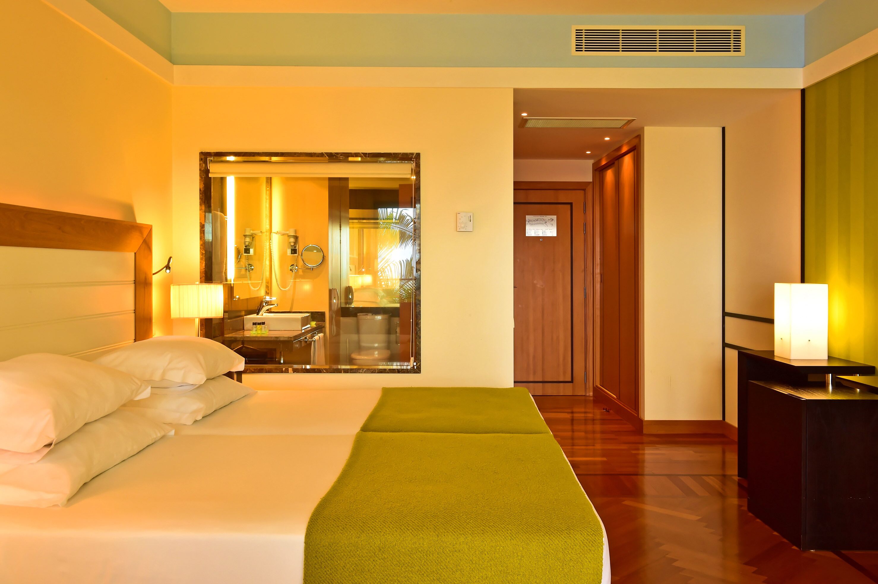 classic twin room, pool view | 1 bedroom, minibar, in-room safe, desk