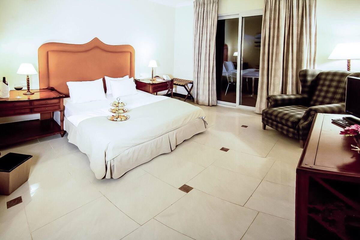 Economy Double or Twin Room, Garden View | Minibar, in-room safe, blackout drapes, soundproofing