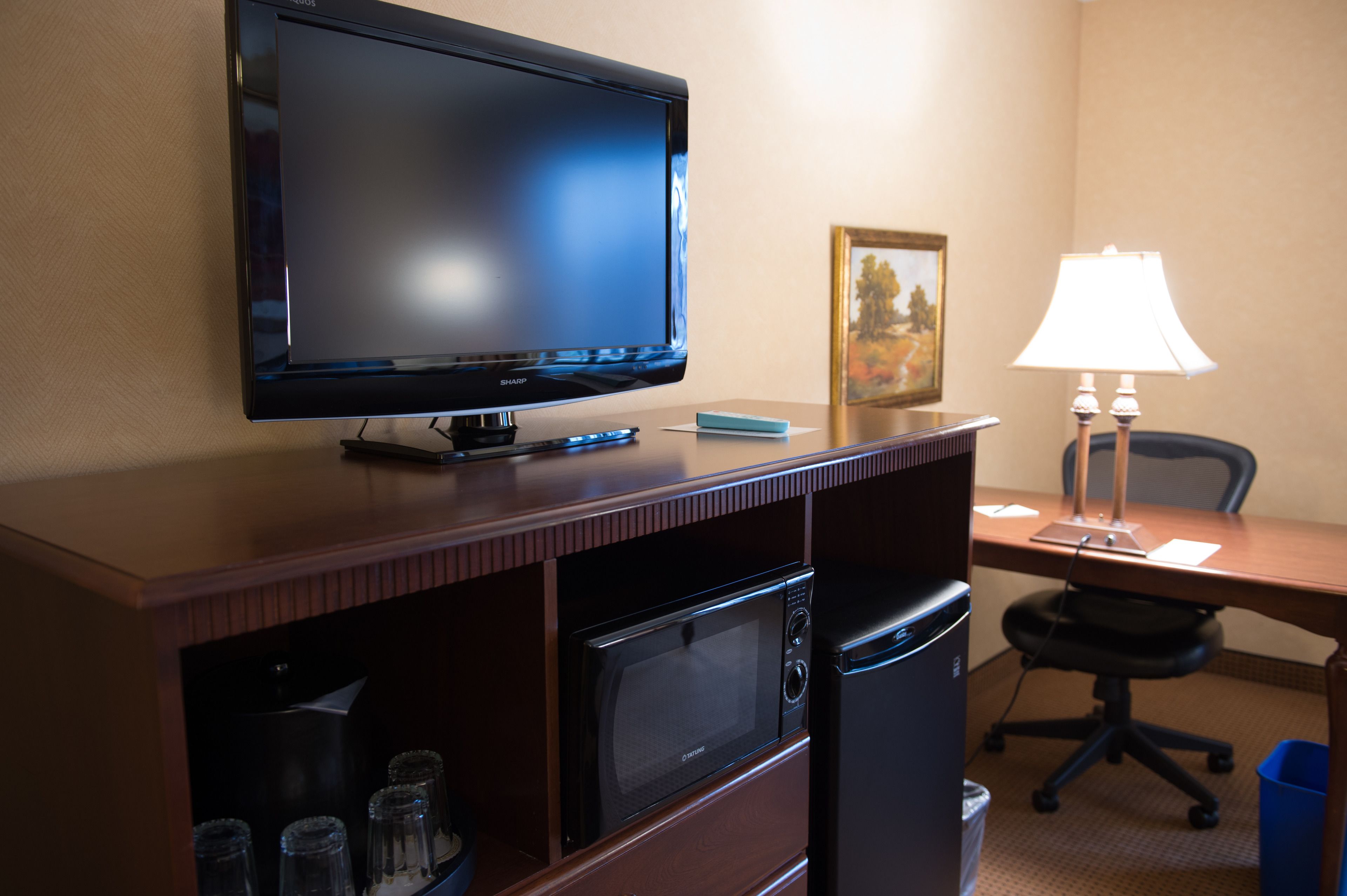 desk, blackout curtains, iron/ironing board, rollaway beds