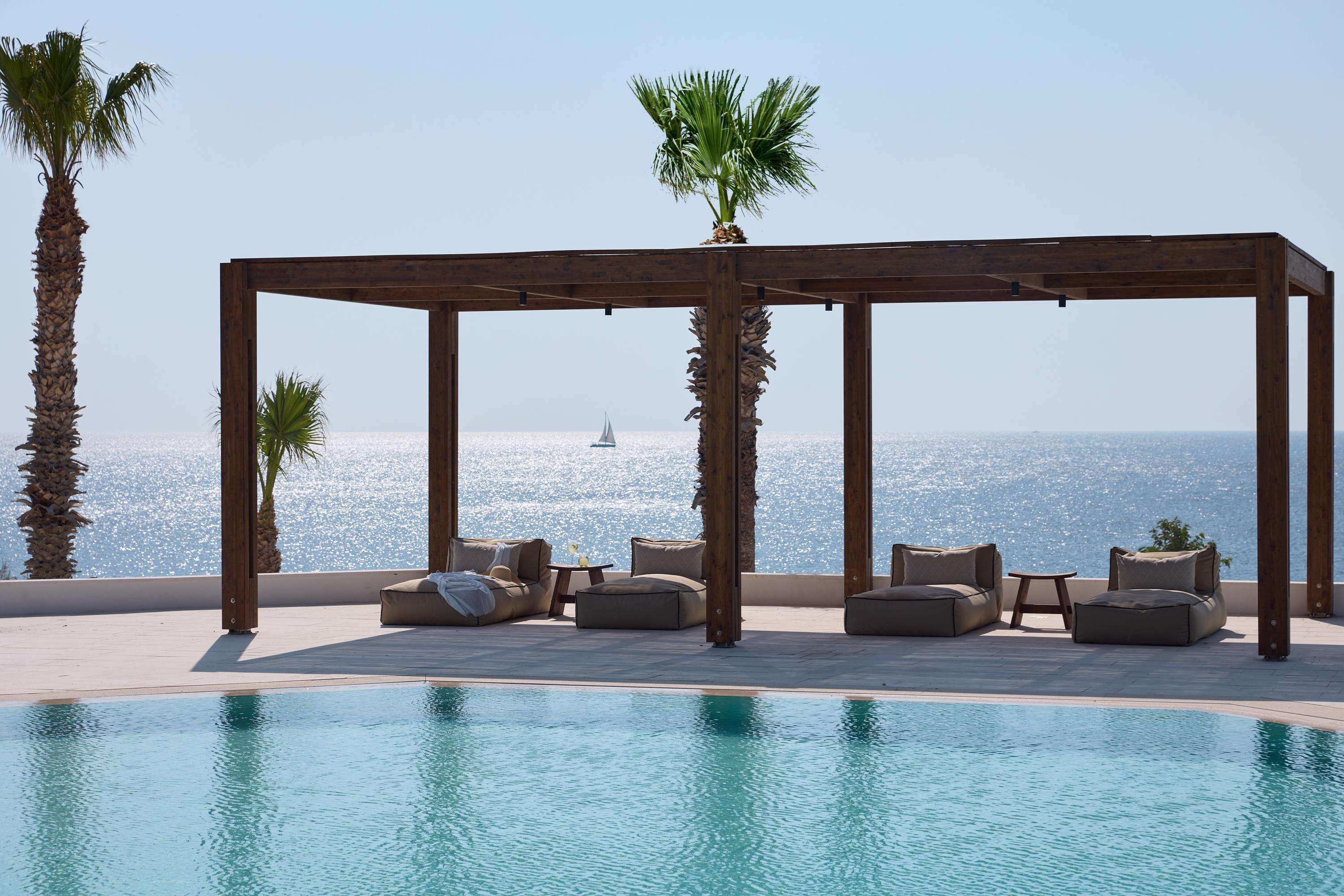 15 outdoor pools, pool umbrellas, pool loungers