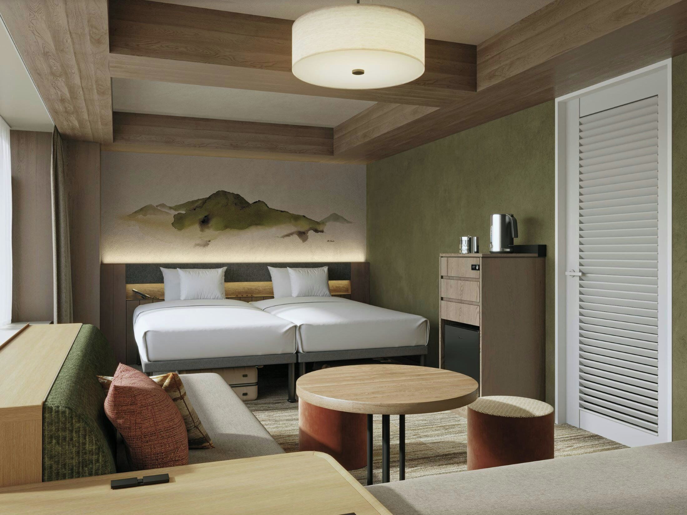 Habitación de hotel con cama, mesitas de noche, escritorio, silla, lámpara, un cuadro y armario.