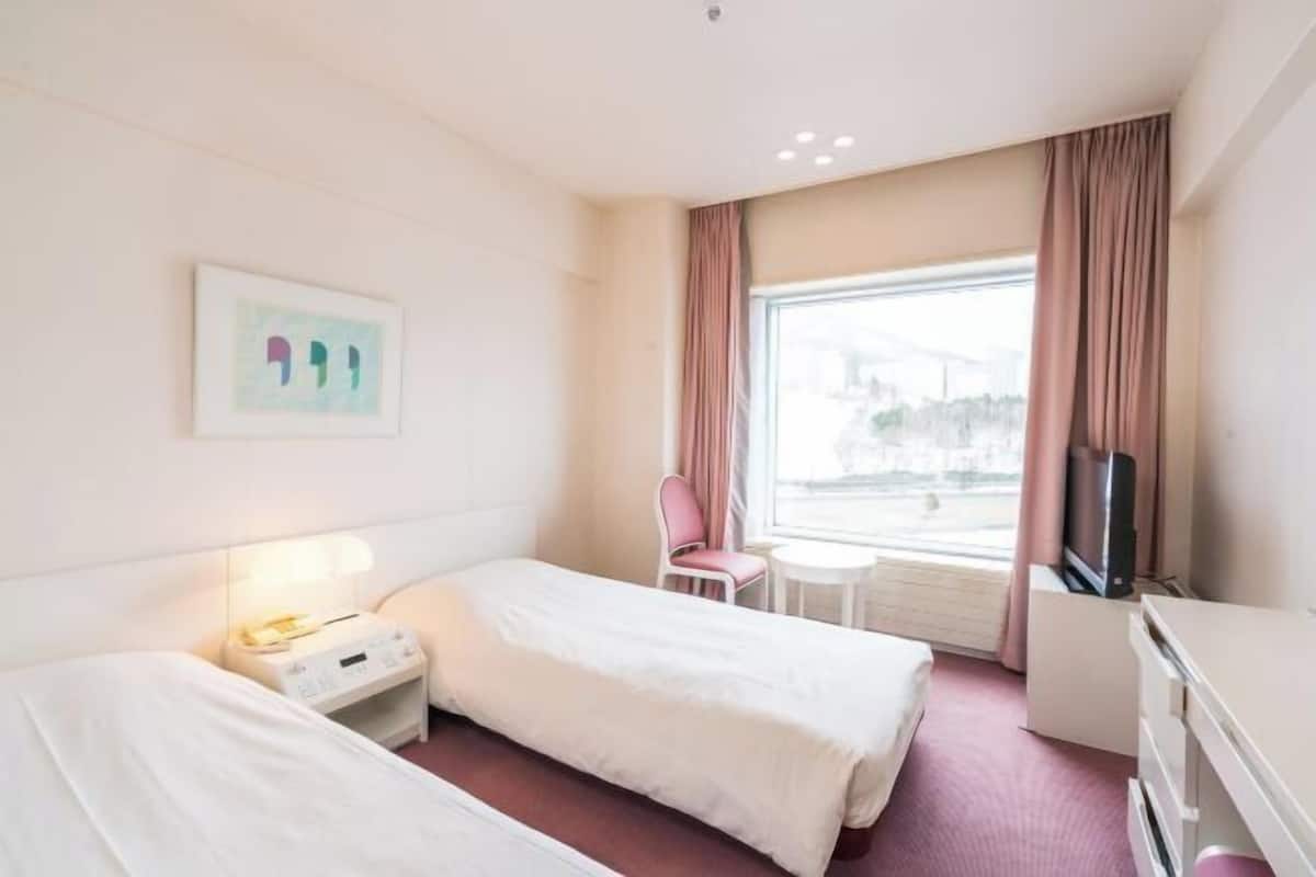 Premium bedding, in-room safe, blackout curtains, iron/ironing board