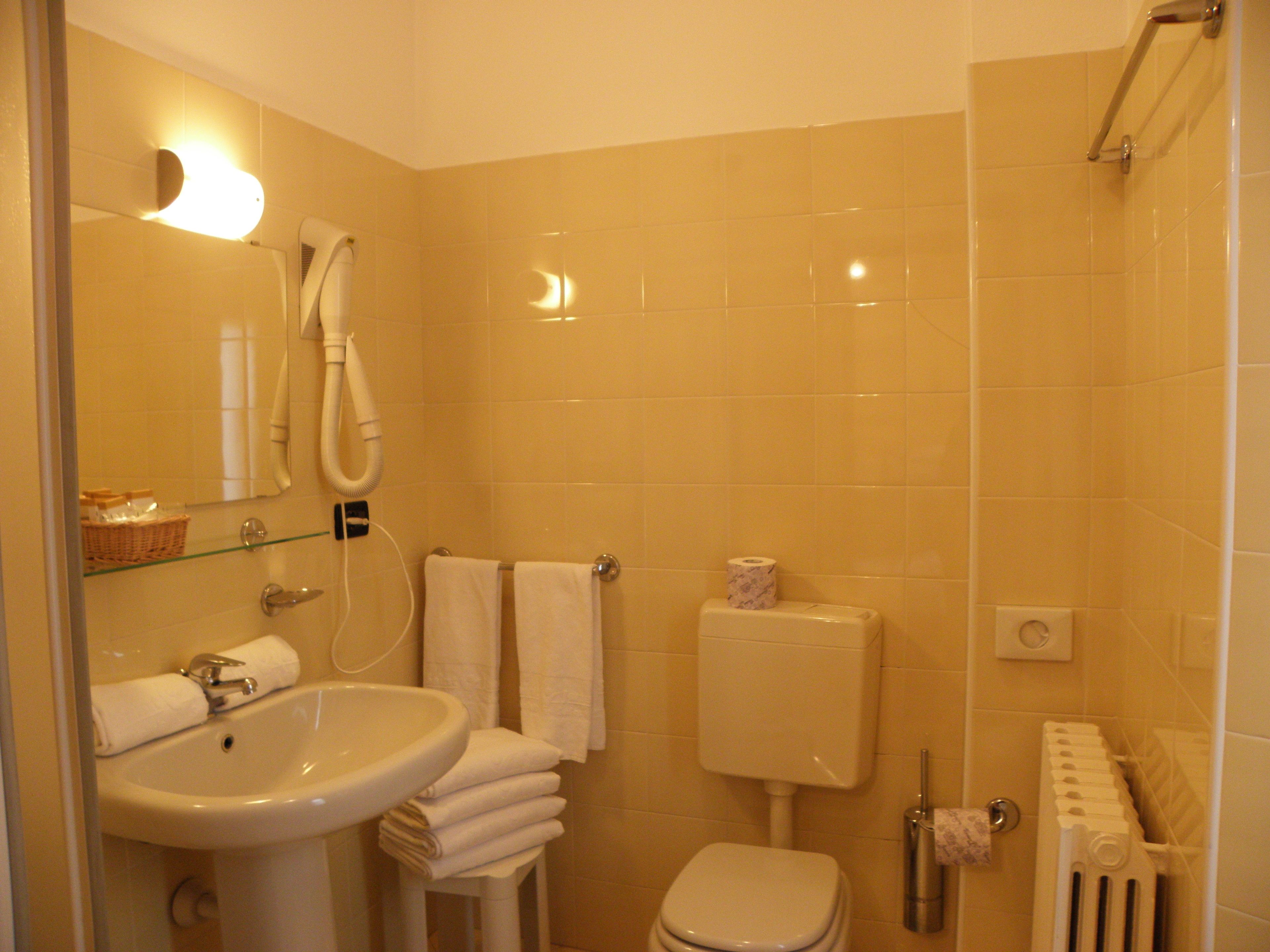 quadruple room | bathroom | shower, free toiletries, hair dryer, towels