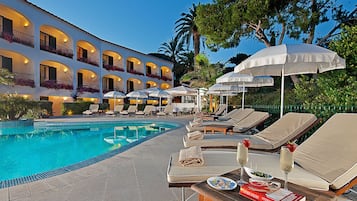 Outdoor pool, pool umbrellas, pool loungers