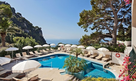 Outdoor pool, pool umbrellas, sun loungers. Hotel della Piccola Marina