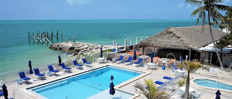 2 outdoor pools, pool umbrellas, sun loungers