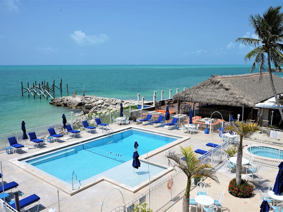 2 outdoor pools, open 8 AM to 9 PM, pool umbrellas, sun loungers