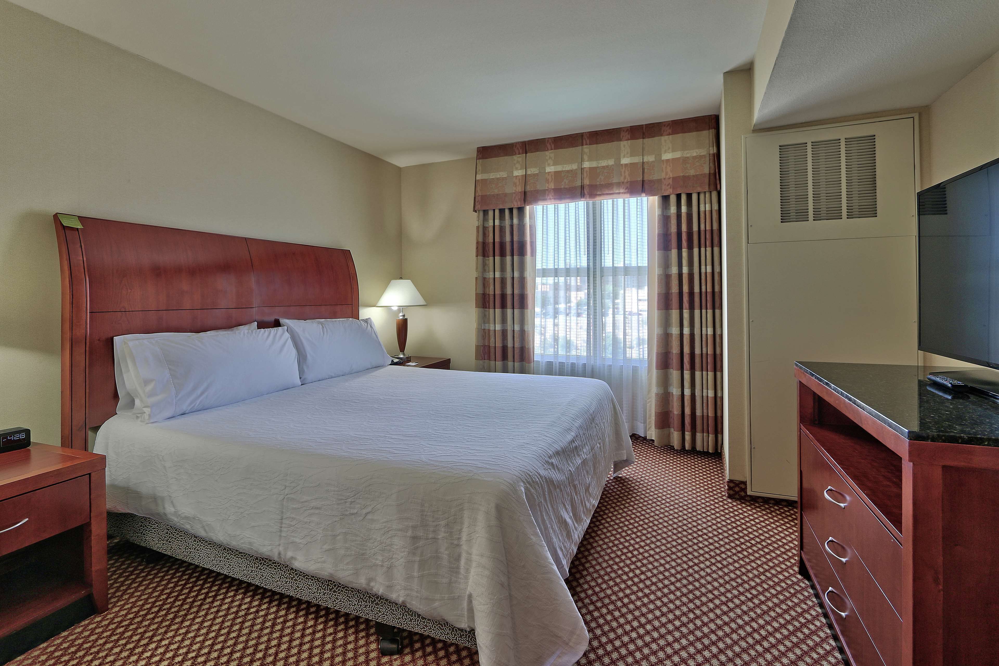 king evolution jr suite | hypo-allergenic bedding, in-room safe, desk, iron/ironing board