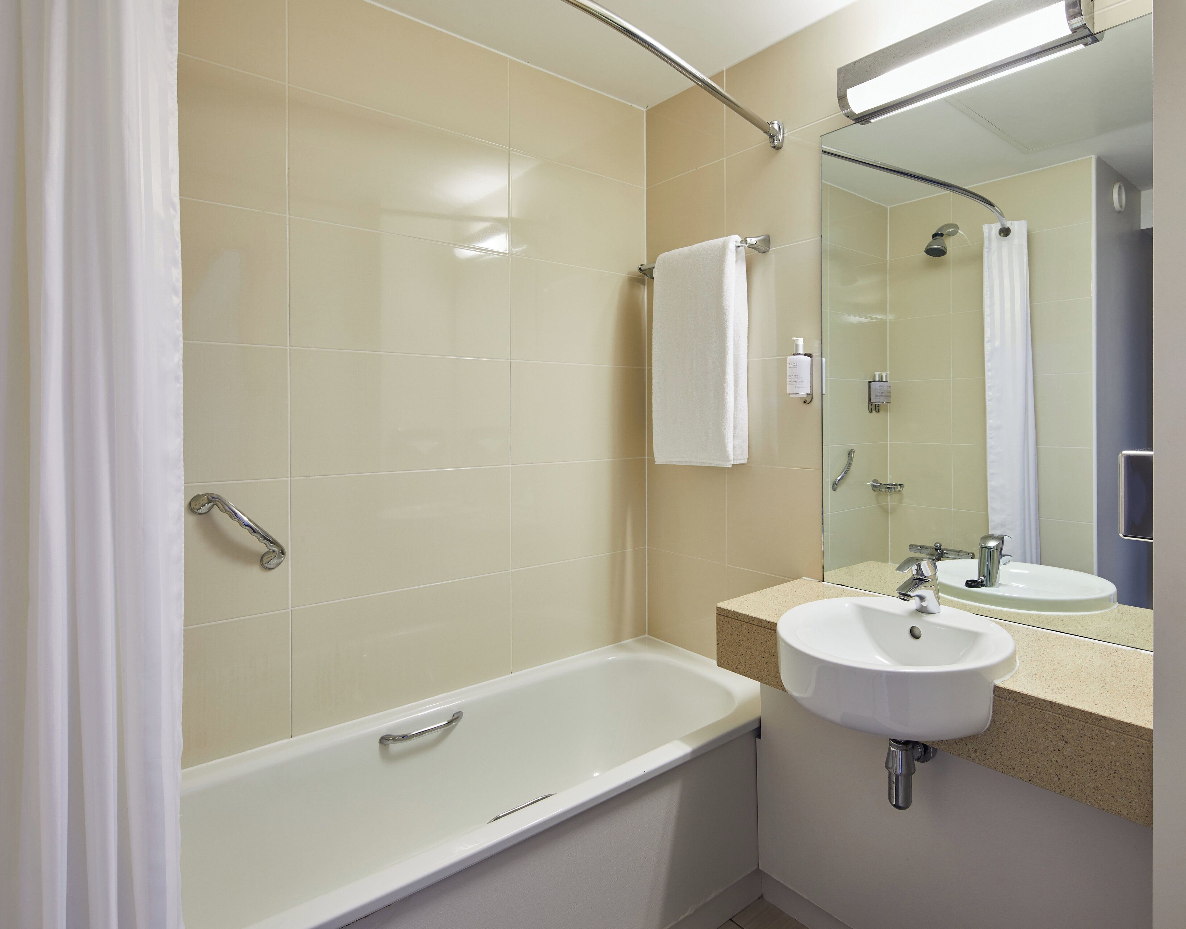 combined shower/bathtub, free toiletries, hair dryer, towels