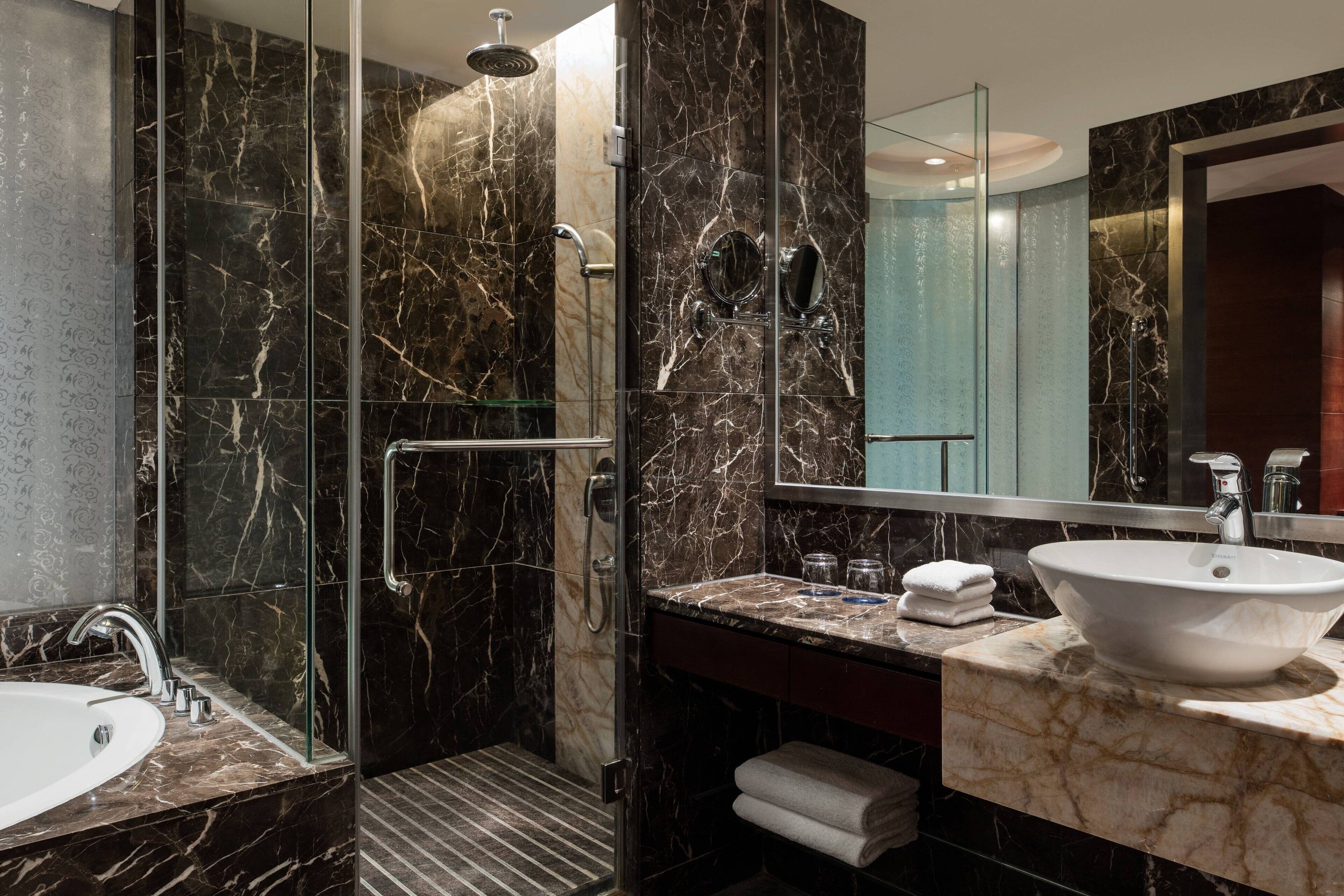 combined shower/bathtub, deep-soaking bathtub, rainfall showerhead