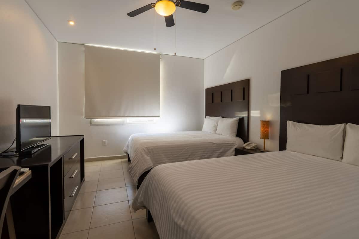 Suite, 2 Double Beds | Desk, free WiFi