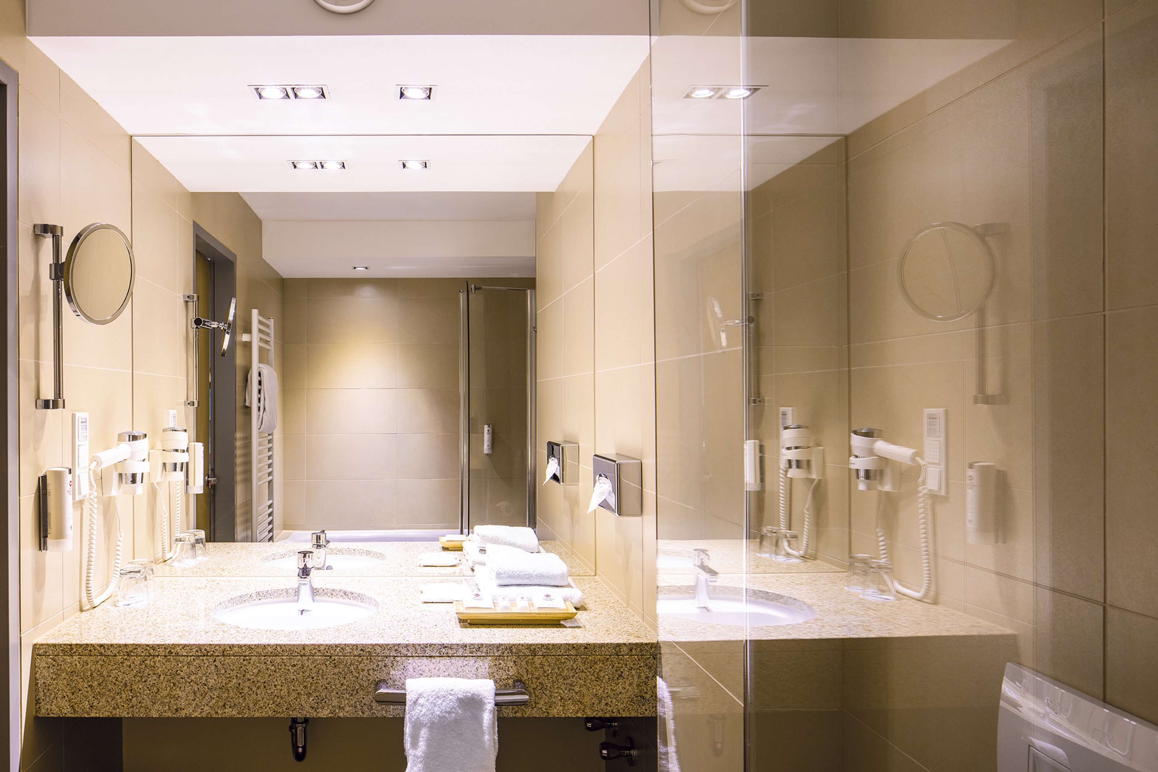 premium room | bathroom | shower, hair dryer, towels