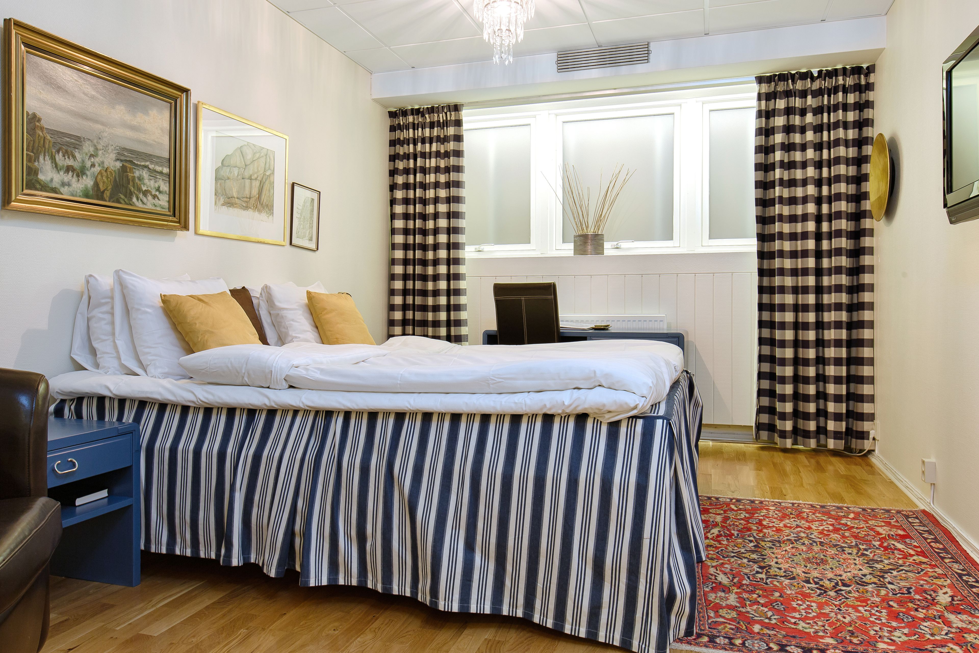 blackout curtains, iron/ironing board, free wifi, bed sheets