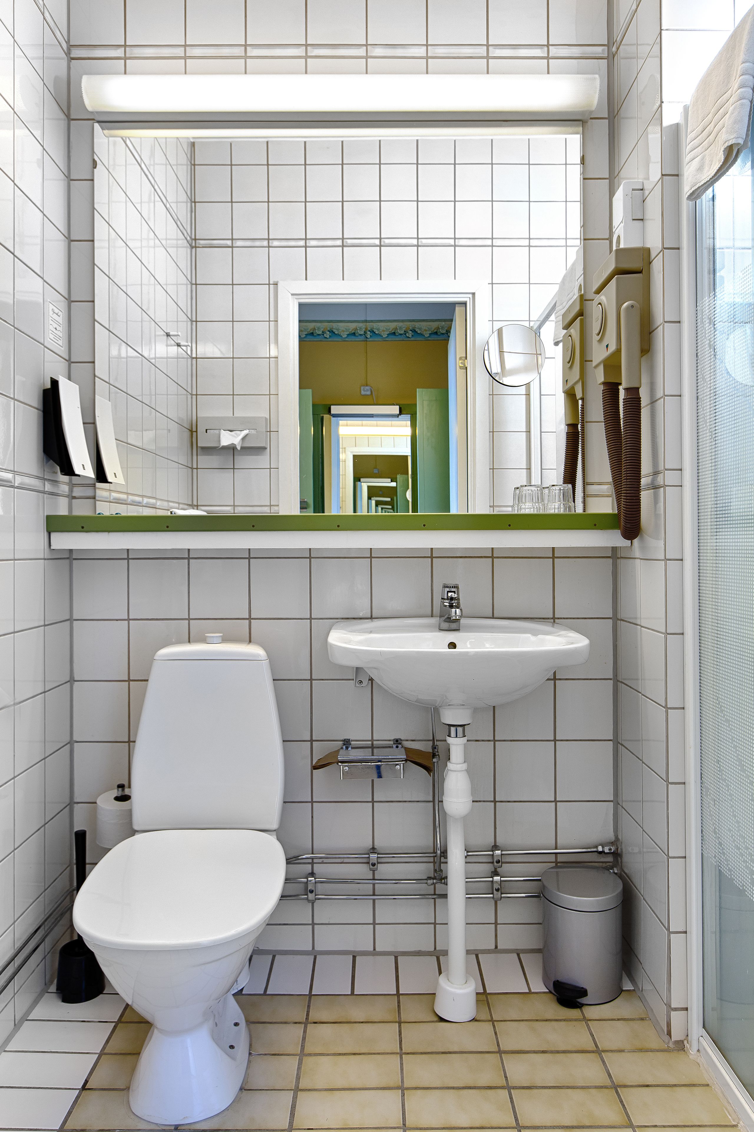 economy double room | bathroom | hair dryer, towels