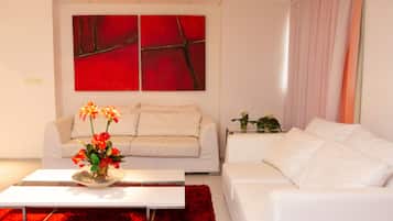 Presidential Double Room | Living area | 32-inch plasma TV with cable channels, TV