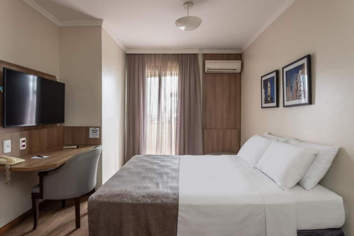 Luxury Room | Hypo-allergenic bedding available, minibar, in-room safe, desk