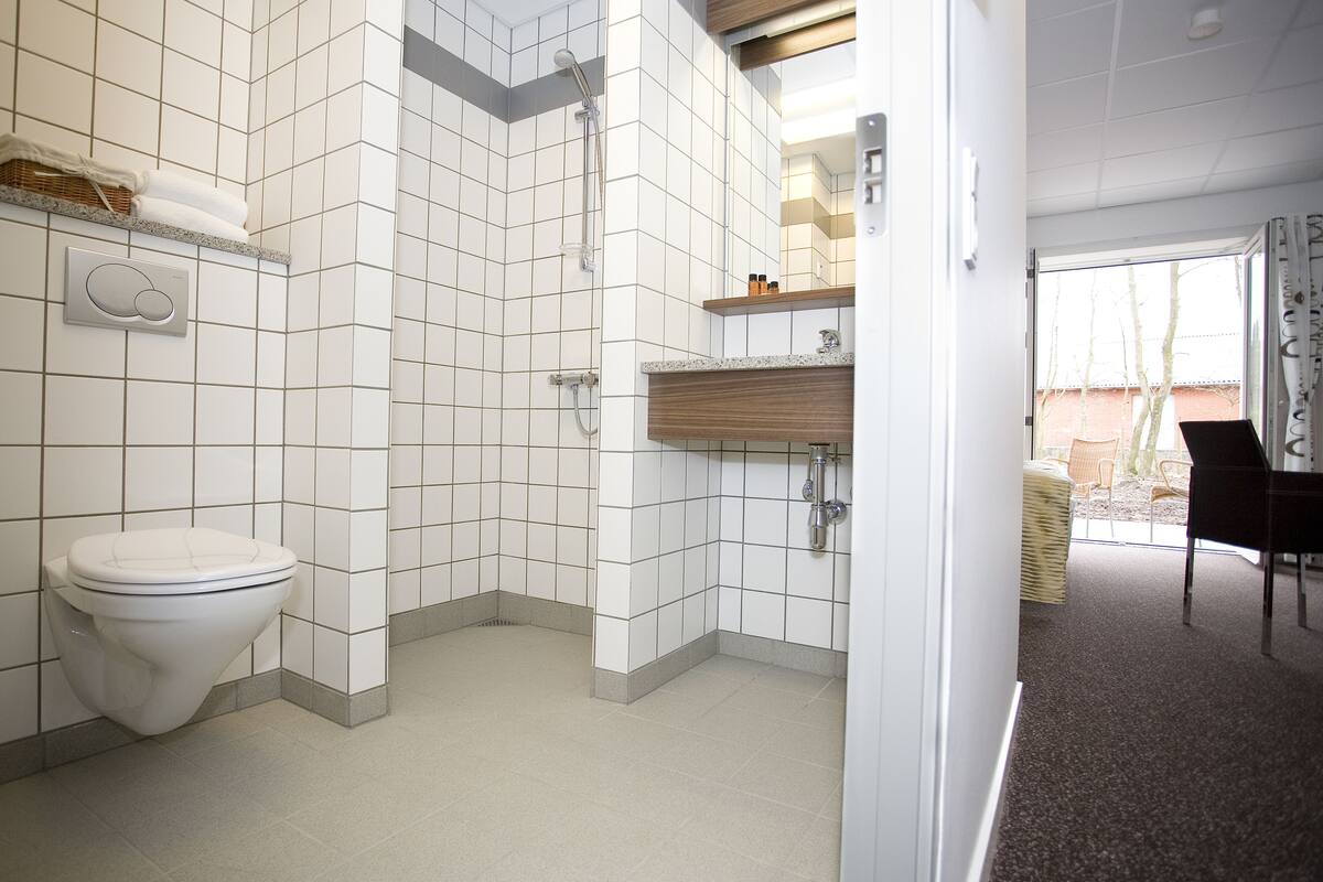 double or twin room | bathroom | shower, hair dryer, towels, soap