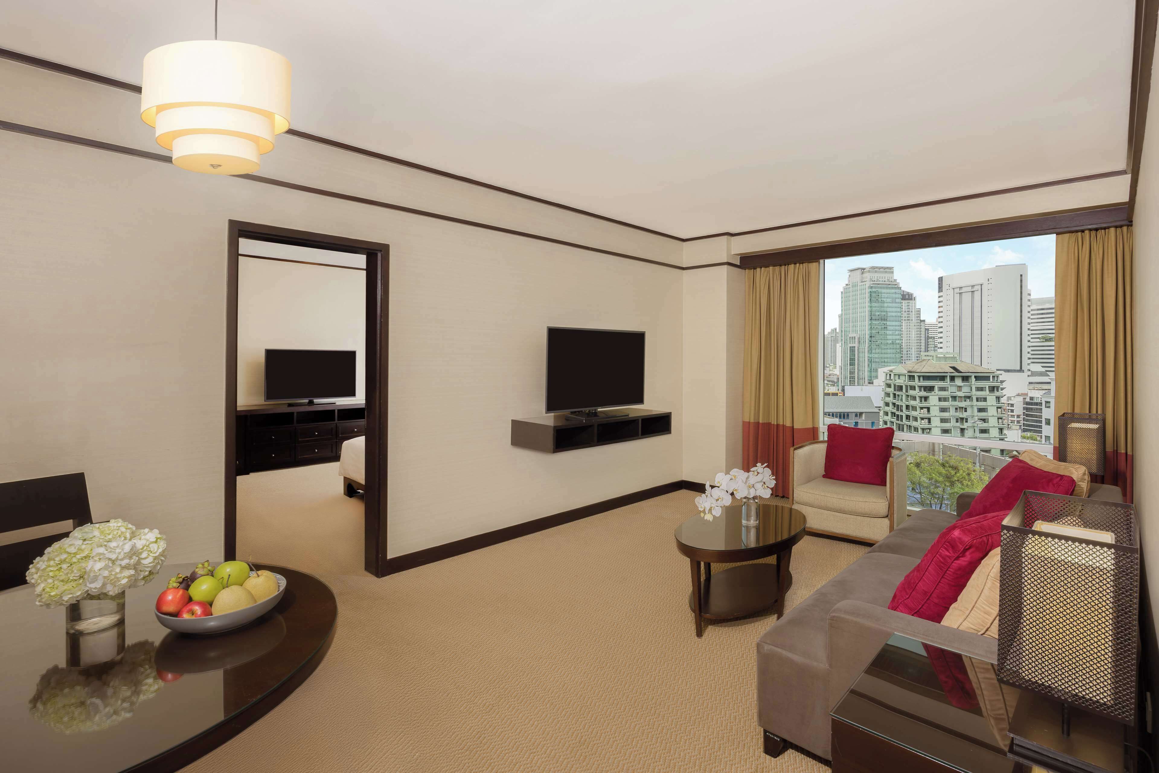 suite, 2 bedrooms (2 king beds) | living area | 42-inch lcd tv with cable channels, tv, video game console