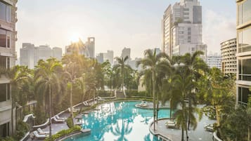 Outdoor pool, open 6:00 AM to 7:00 PM, pool umbrellas, pool loungers