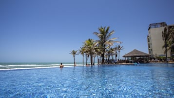 2 outdoor pools, pool umbrellas, pool loungers