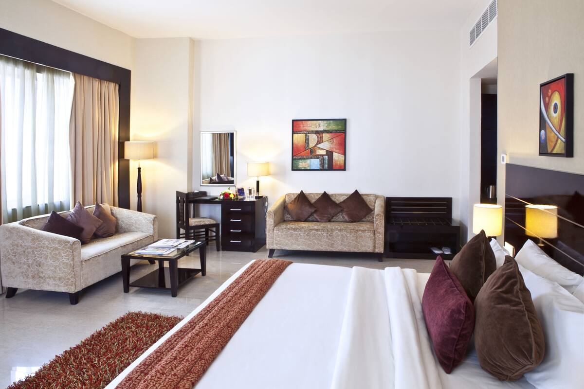 Suite ejecutiva | 1 habitación, edredón, minibar y caja de seguridad en la habitación 