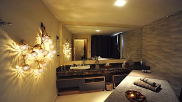 Relax in a serene space with a large vanity, plush bed, and soothing ambiance.