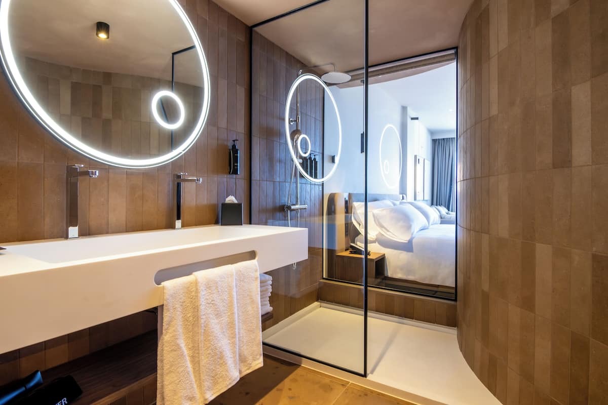 Shower, eco-friendly toiletries, hair dryer, bathrobes