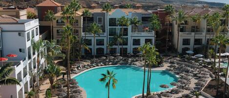 2 outdoor pools, open 9:00 AM to 6:00 PM, pool umbrellas, sun loungers