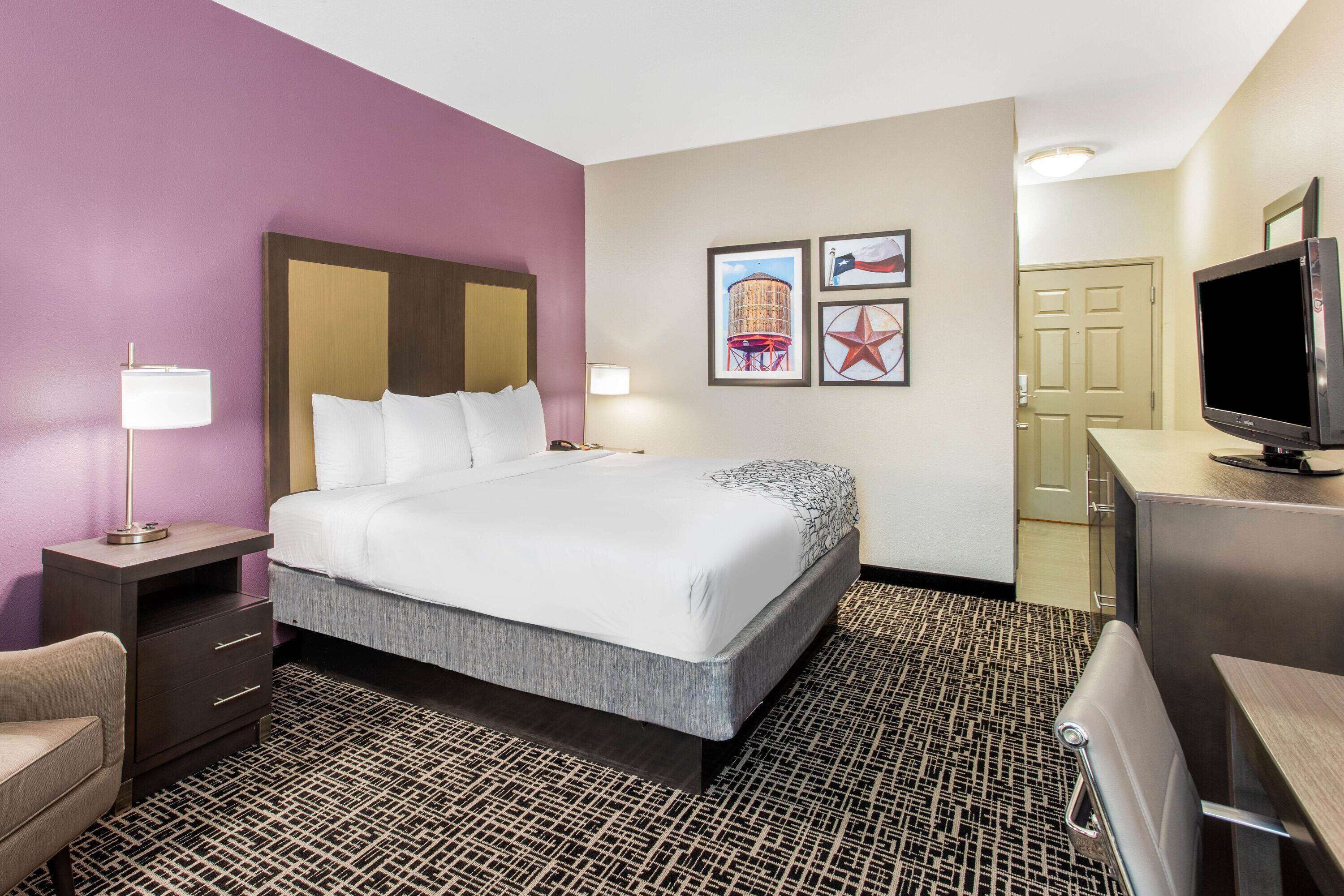 premium bedding, pillow-top beds, desk, laptop workspace