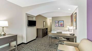 Premium bedding, pillow-top beds, desk, laptop workspace