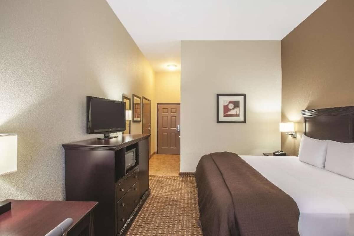 Premium bedding, pillow-top beds, desk, laptop workspace