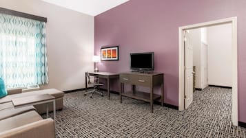 Premium bedding, pillow-top beds, desk, laptop workspace