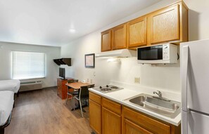 Standard Studio, Non Smoking, Refrigerator & Microwave | Private kitchen | Full-size fridge, microwave, stovetop, freezer - Extended Stay America Select Suites - Salt Lake City - West Valley City (West Valley City)