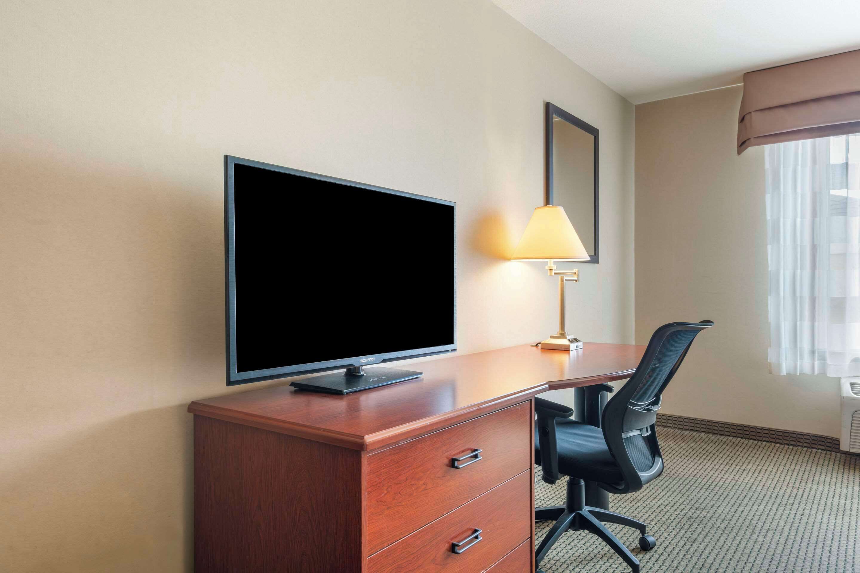 down duvets, pillow-top beds, desk, laptop workspace