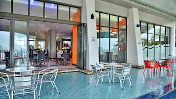 Outdoor pool, open 8:00 AM to 9:00 PM, sun loungers