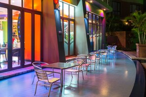 Outdoor pool, open 8:00 AM to 9:00 PM, pool loungers