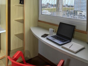 Minibar, desk, blackout drapes, soundproofing