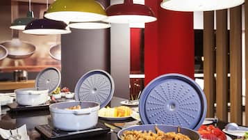 Breakfast, lunch, dinner served; international cuisine, garden views