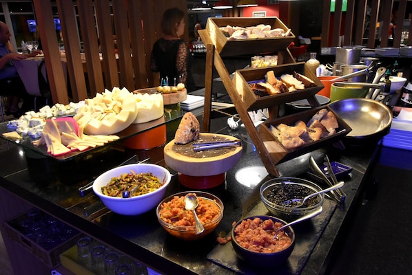 Breakfast, lunch, dinner served; international cuisine, garden views