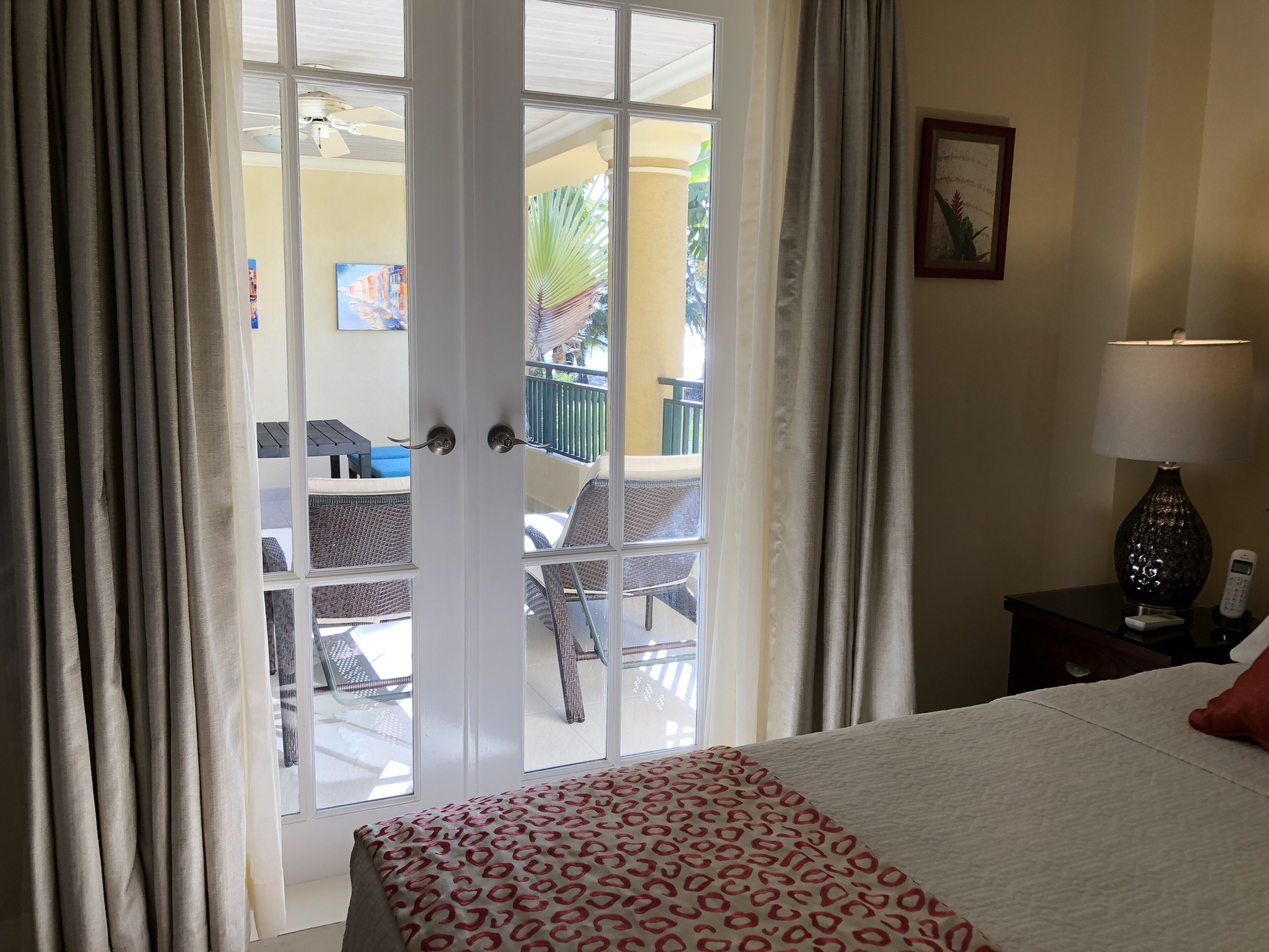 standard condo, 1 king bed, 2 bathrooms, partial ocean view | terrace/patio